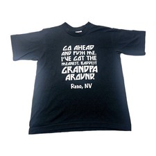 A novelty T-shirt Size 10/12 Go ahead and push me.