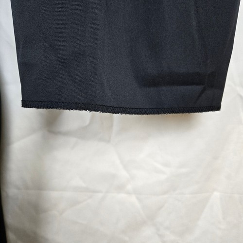Pantaloni eleganti casual leggeri Nike uomo neri Dri-Fit Tech flat davanti taglia 42 - Foto 8 di 9