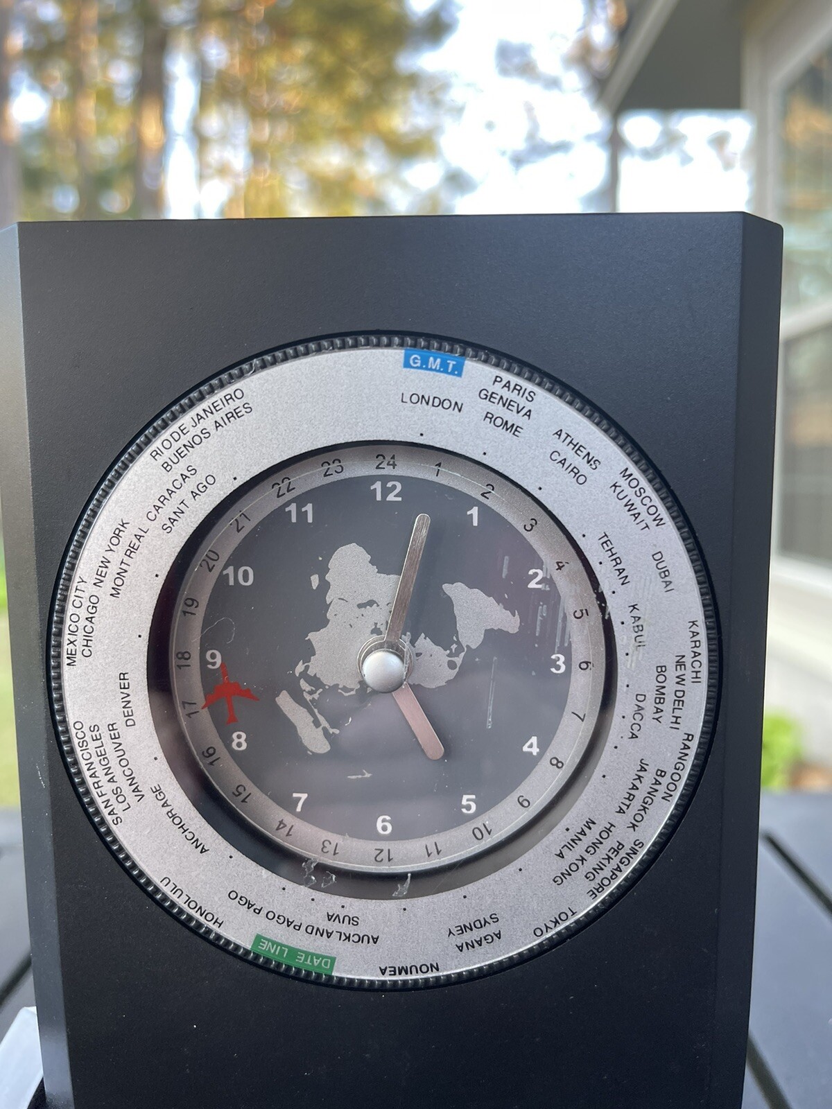 World Time Zones Clock 7.5 X 4 Inches. Black And Silver With Moving Pendulum 