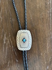Sterling Navajo Stamped Bolo With Small Turquoise Stone And Tips