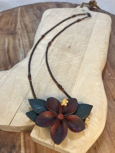 Hawaiian-style plumeria flower necklace