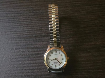Vintage Timex Indiglo Women s Gold Tone Stretch Band Watch WR30M Running