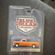 Greenlight 1:64 Blue Collar 1982 Dodge D-250 Orange Diecast Pickup Truck
