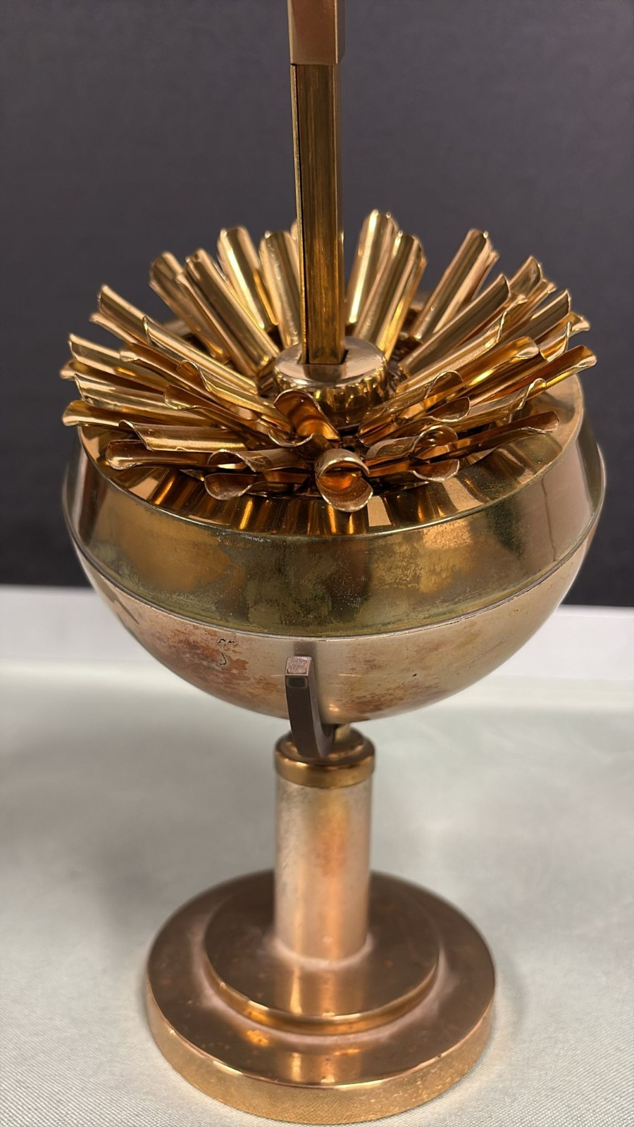 VINTAGE MID 1900'S FLOWERY GLOBE SHAPED BRASS CIGARETTE HOLDER