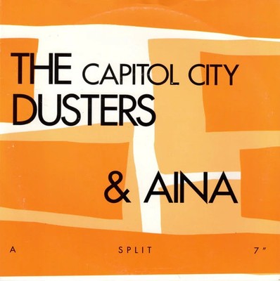 USED: The Capitol City Dusters & Aina  - A Split 7'' (7'', Blu) vinyl - grading in