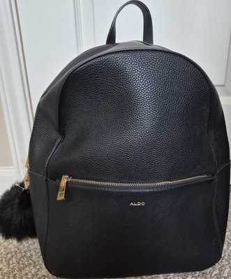ALDO Black Pebbled Backpack with Gold Hardware, Pom Pom Accent, Women