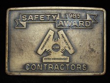 OI25147 VINTAGE 1985 P.U.M.P. CONTRACTORS SAFETY AWARD BRASSTONE BELT BUCKLE