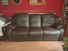 BROWN GENUINE LEATHER 2 SEATER SOFA.