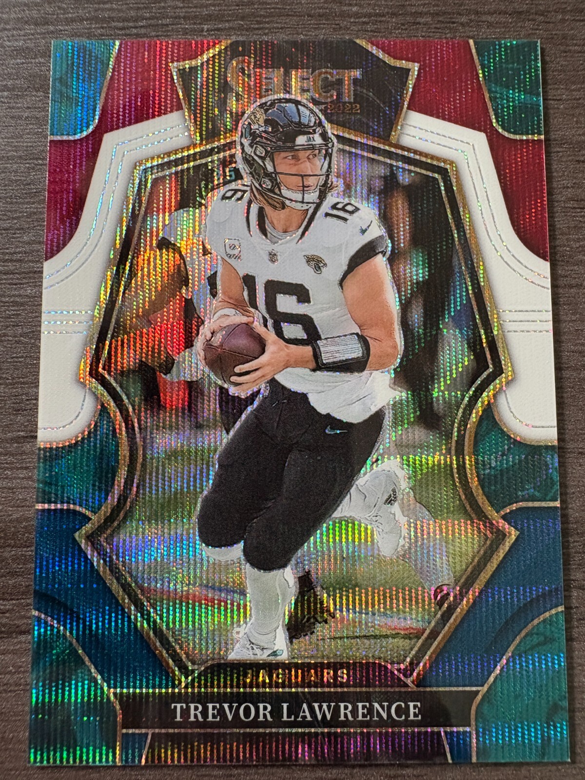 2022 Panini Select Trevor Lawrence #145 Premier Level Tricolor Prizm serial /199
