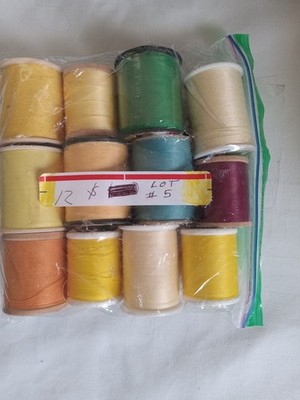 12 spools sewing thread, misc. brands, some used & some new spools. Lot #5