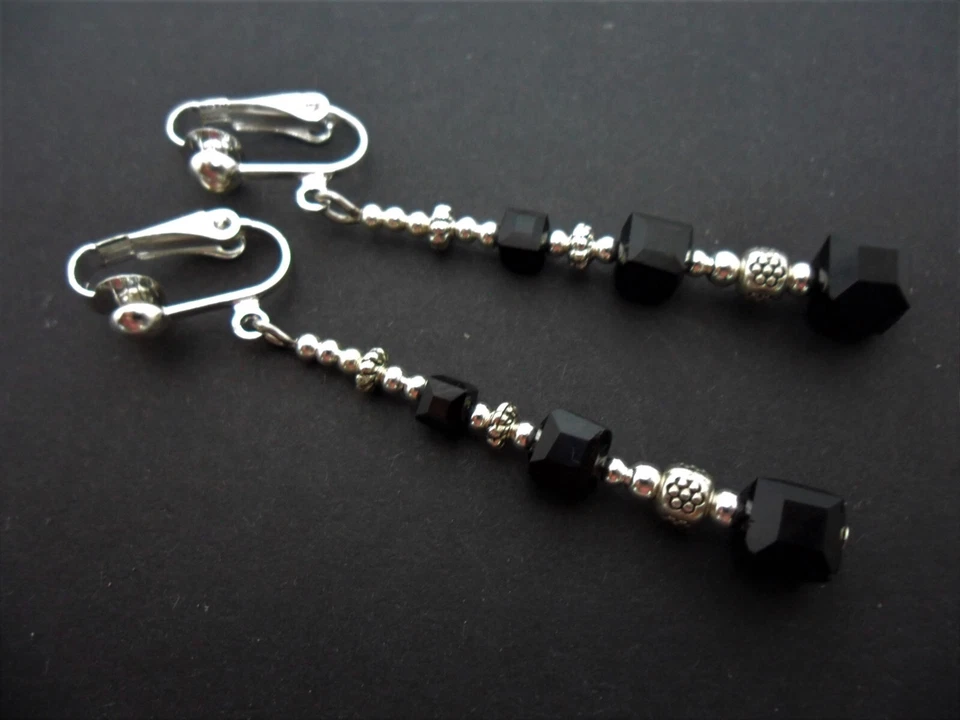 A PAIR SILVER PLATED BLACK CUBE BEAD LONG DANGLY CLIP ON EARRINGS. NEW. - Image 1 of 1