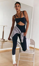 FREE PEOPLE FP MOVEMENT WASHED BLACK GOOD KARMA CUTOUT JUMPSUIT ONE PIECE M/L