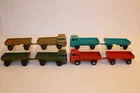 Four (4) Vintage 1960's - 1970's Matchbox Lesney Mercedes Trucks with Trailers