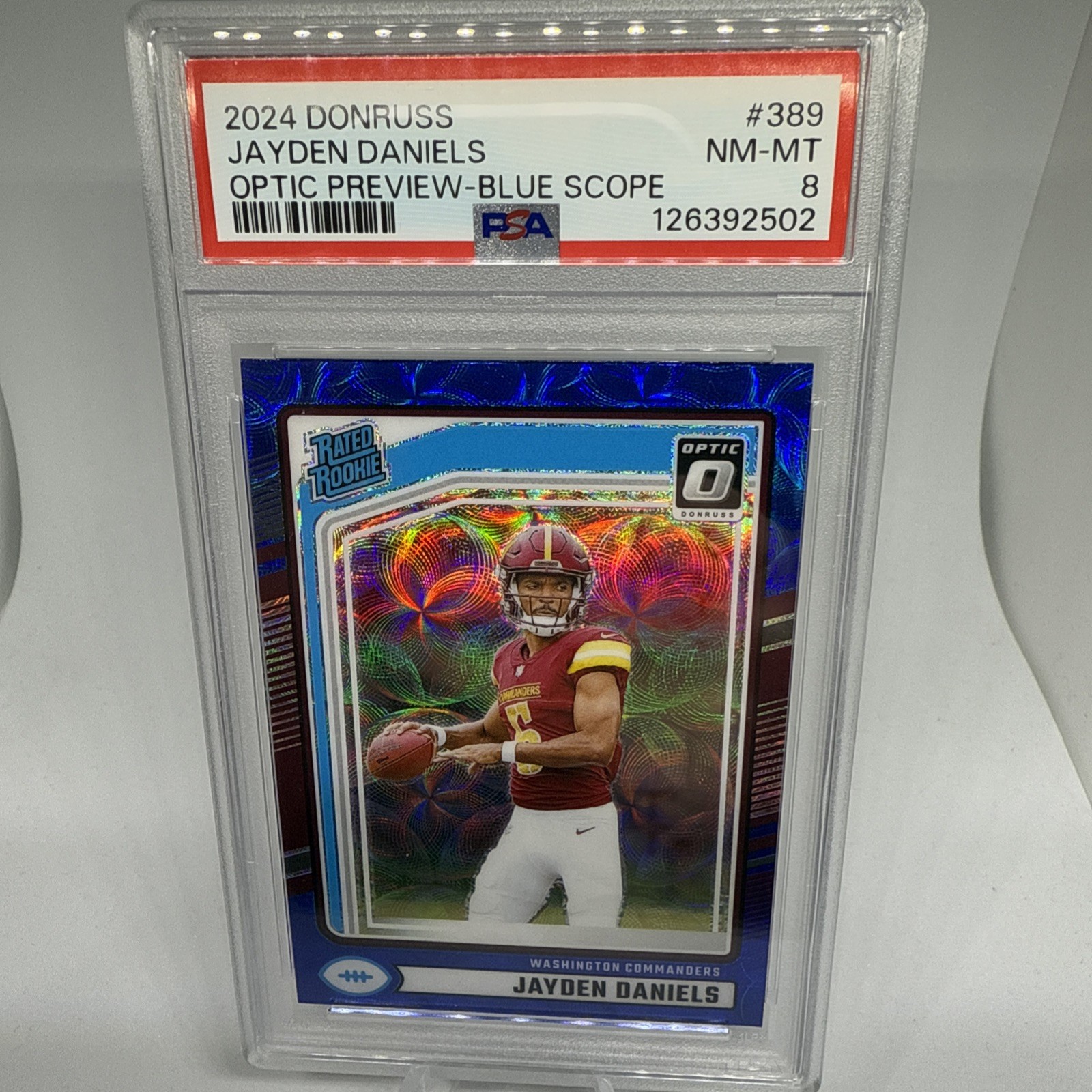 2024 Panini Donruss Rated Rookie Jayden Daniels Optic Preview Blue Scope PSA 8