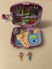 vintage 1996 Polly Pocket Holiday Fun pink suitcase playset by Bluebird Toys.
