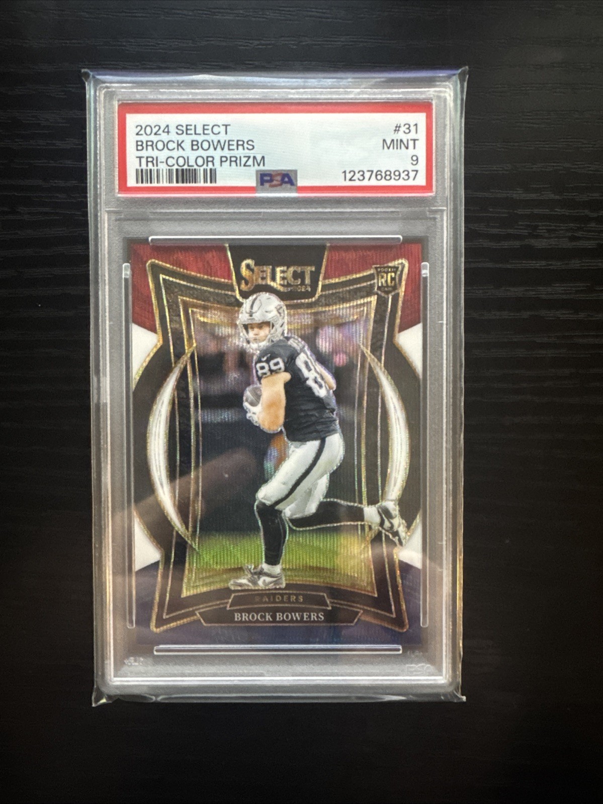 2024 Panini Select #31 Brock Bowers Tri-Color Prizm /299 PSA 9 Las Vegas Raiders