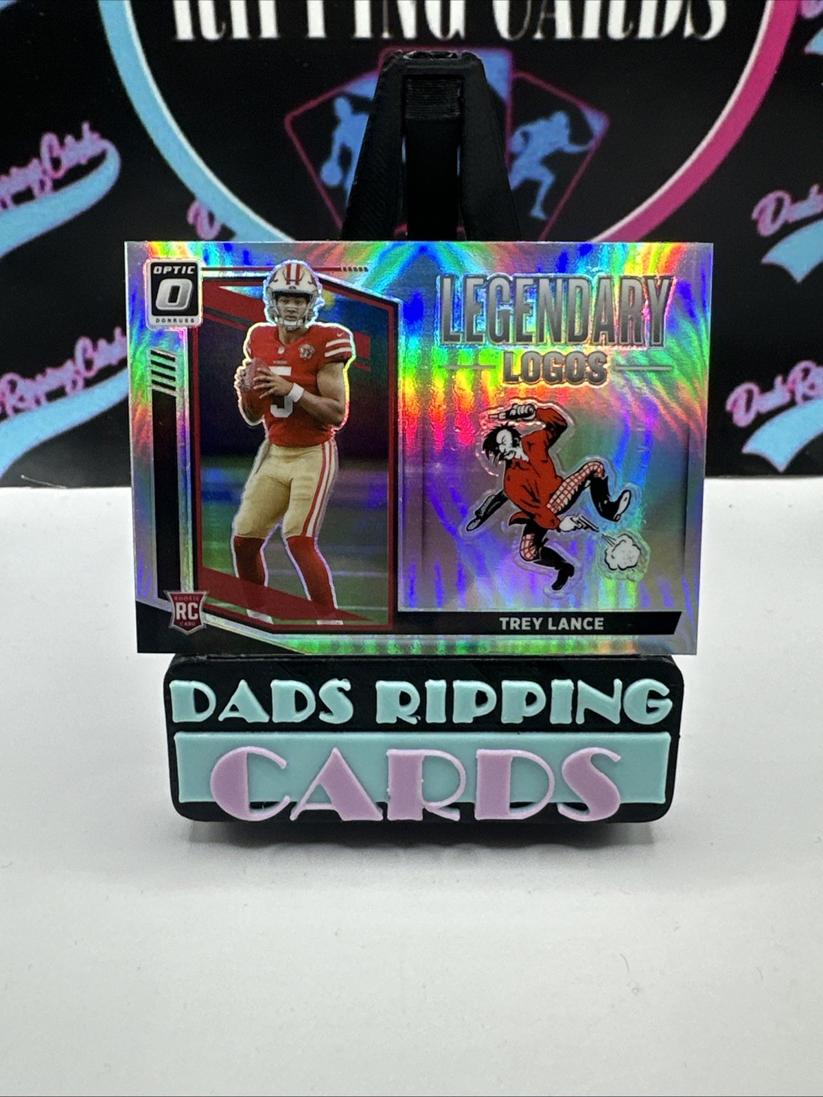 2021 Panini Donruss Optic - Legendary Logos Trey Lance #LL-18 (RC) Holo Prizm