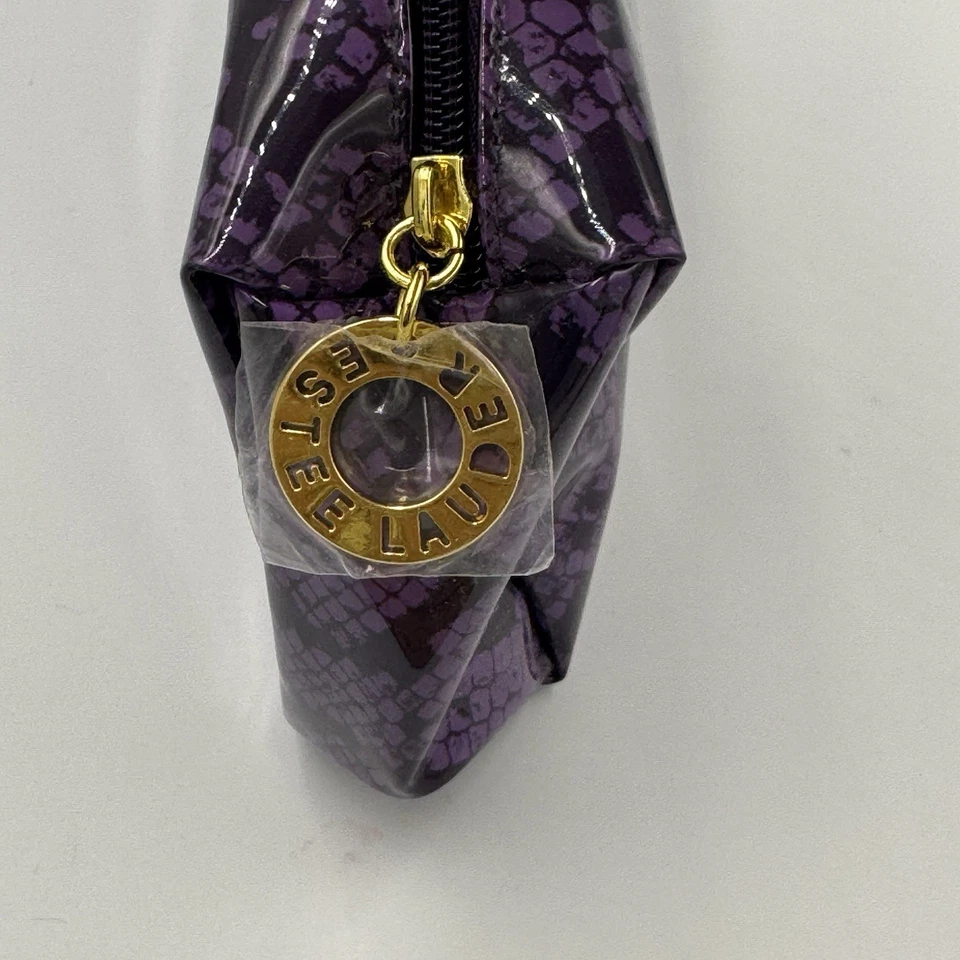 Bolso de Cosméticos Estee Lauder Púrpura Estampado Animal Piel de Serpiente Cremallera Logo Foto 2 de 4