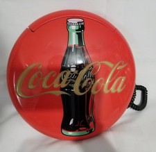 Ancien téléphone rond Coca Cola avec lumière