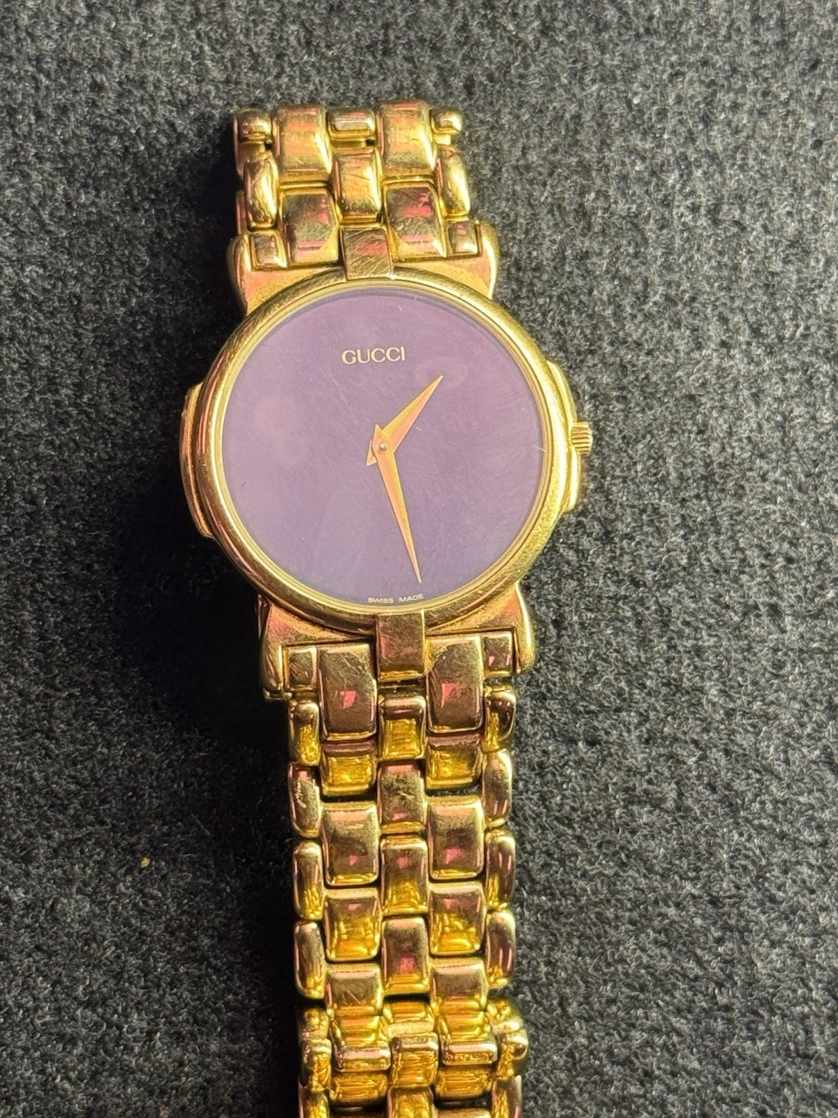 Montre Gucci vintage 3400 M plaqué or fabrication suisse quartz   unisexe   cadran fin