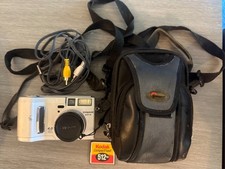 Minolta DiMAGE S414 camera w/ 512MB memory card, AV cord, & bag Tested & Working