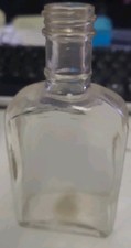 Vintage Three Ounce Embossed Glass Bottle Made In USA Miniature Collectible