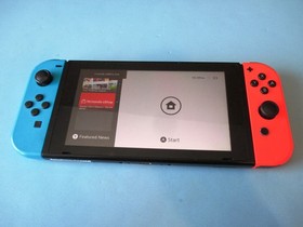 Nintendo Switch System Console w/Neon Red & Blue Joy-Cons + Dock & Extras