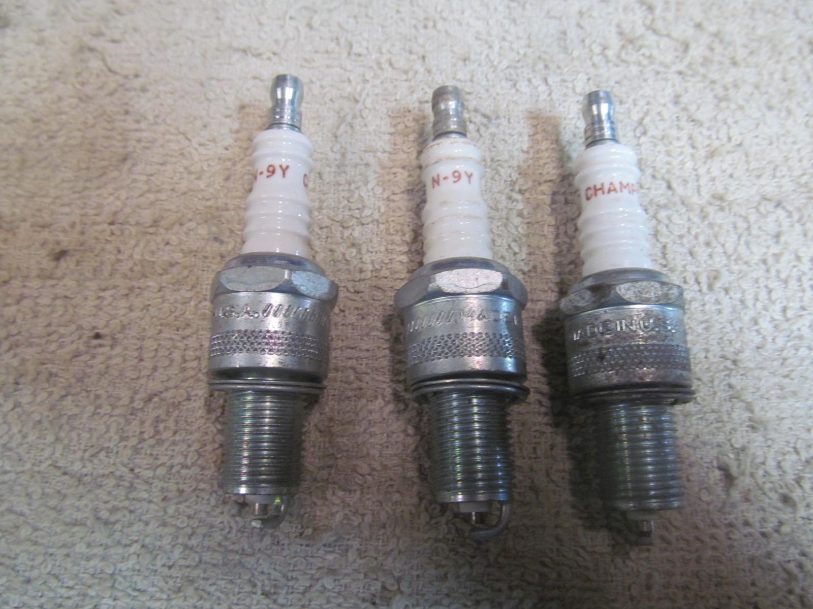 3 NOS CHAMPION SPARK PLUGS, PART NUMBER N-9Y, 14MM THREAD.