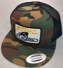 STIHL Patch on Yupoong Trucker Hat / YP Classic 6006 Snapback Camo/Black