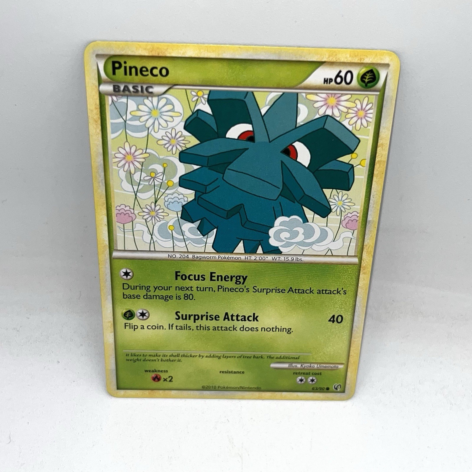 Pineco 63/90 Common HGSS Undaunted Pokemon Card