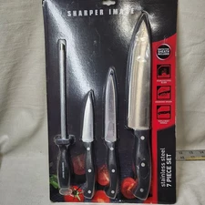 Sharper Image 4-piece stainless steel knife set.