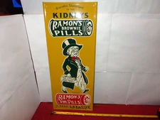 7x17 in RAMON`S LAXATIVE & KIDNEY PILLS ADV. SIGN DOMED TIN METAL TACKER - S 318
