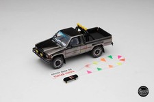 Diecasttalk Mdx Exclusive 164 Toyota 1985 Hilux Sr5 4x4 Black Chrome Black Skat