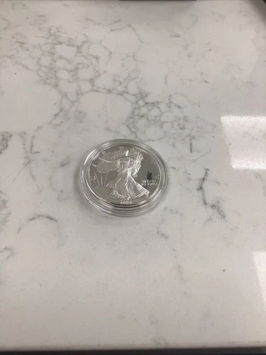 1994-P American Eagle Silver uncirculated Dollar in original Mint box with COA