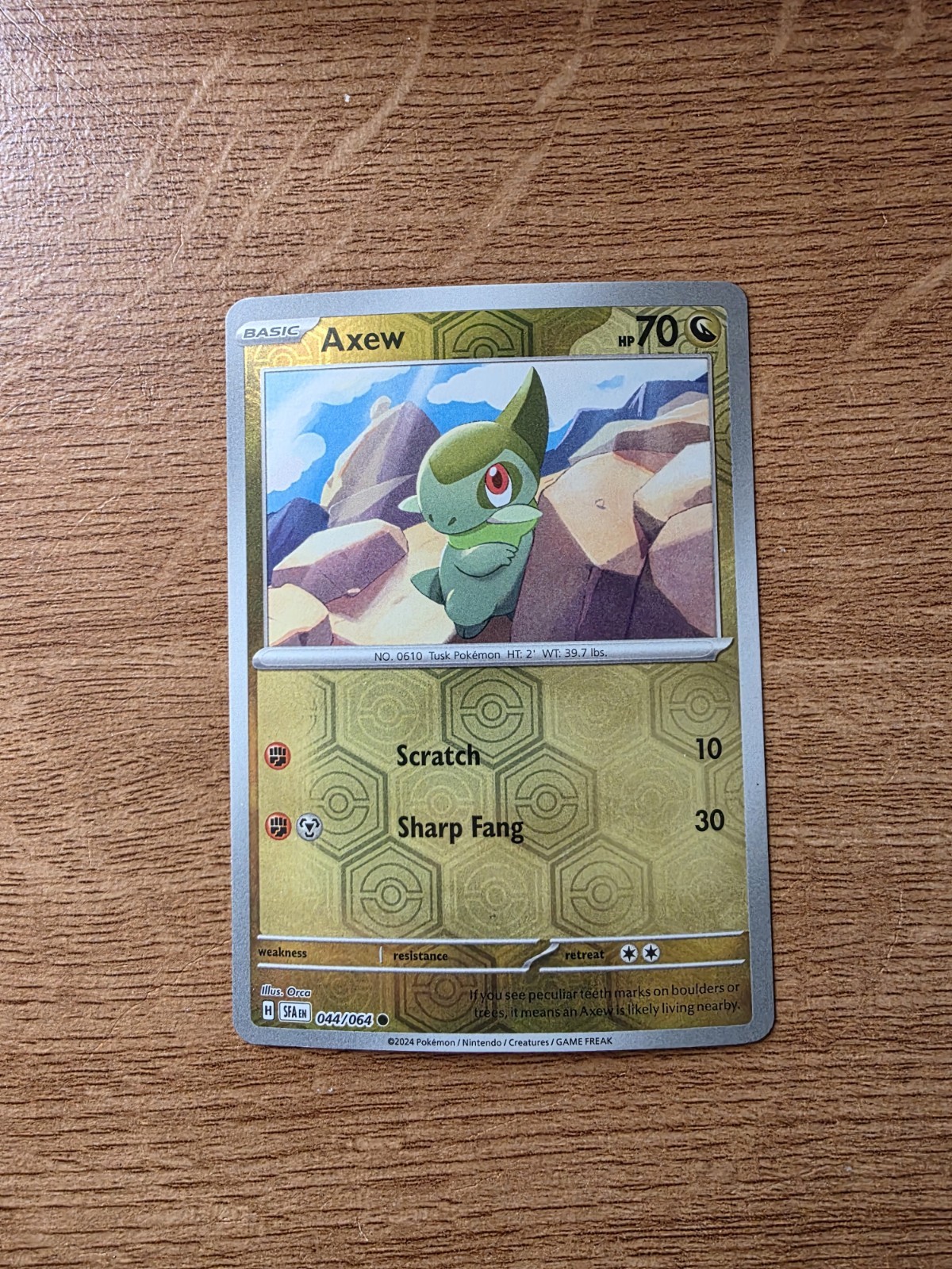 Axew 44/64 SV: Shrouded Fable Holo Pokemon Card