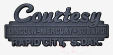 Courtesy Lincoln Mercury Subaru Rapid City S. Dak. Dealer Trunk Emblem Courtesy Lincoln Mercury Subaru Rapid City S. Dak. Dealer Trunk Emblem