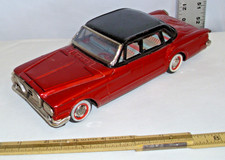 1960 PLYMOUTH VALIANT 4 DOOR CAR VISIBLE ENGINE TIN FRICTION TOY JAPAN