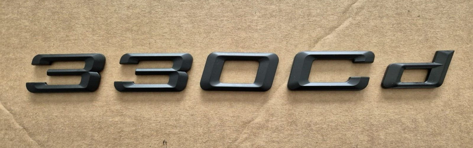 Monogramme adhésif noir mat pour coffre de BMW Série 3 330cd