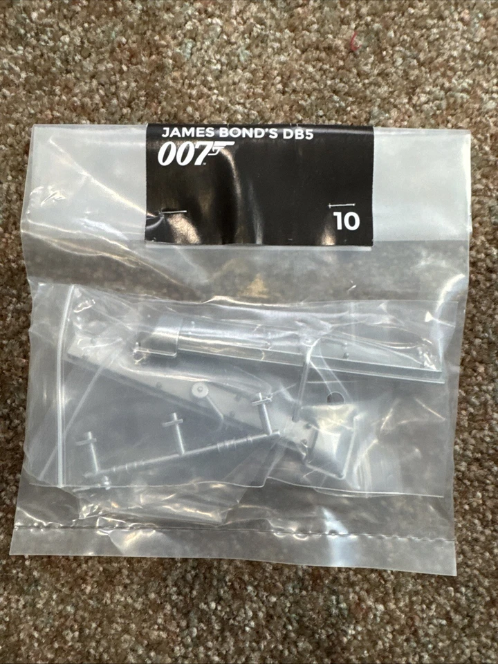 Eaglemoss James Bond Aston Martin DB5 escala 1:8 lote de 10 piezas con 2 cargadores Foto 4 de 4