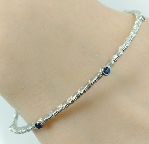 Ariva Sterling Silver Blue Topaz 2mm Stackable Infinity Bangle Bracelet