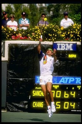 Javier Sanchez swings at the ball during a match at the Newsweek T- Old Photo 1