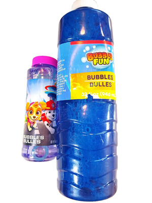 Two bottles of bubbles with wands, one Paw Patrol themed sealed