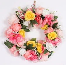 Beautiful Floral Wreath in Pinks Yellow and White with Green Leaves