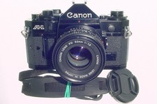 Canon A-1 35mm SLR Film Manual Camera with Canon 50/1.8 FD Lens - Excellent