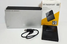 LOT OF 2 EXTERNAL HARD DRIVES 1TB EACH - LA CIE PORSCHE DESIGN & WD MY PASSPORT