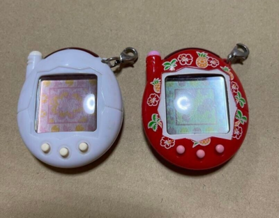 Bandai Keitai Kai Two Tamagotchi Plus Aloha Red and All White Set