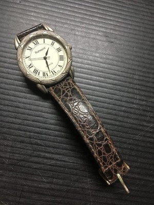 Rumours Quartz Watch with Roman Numerals and Embossed Leather Strap