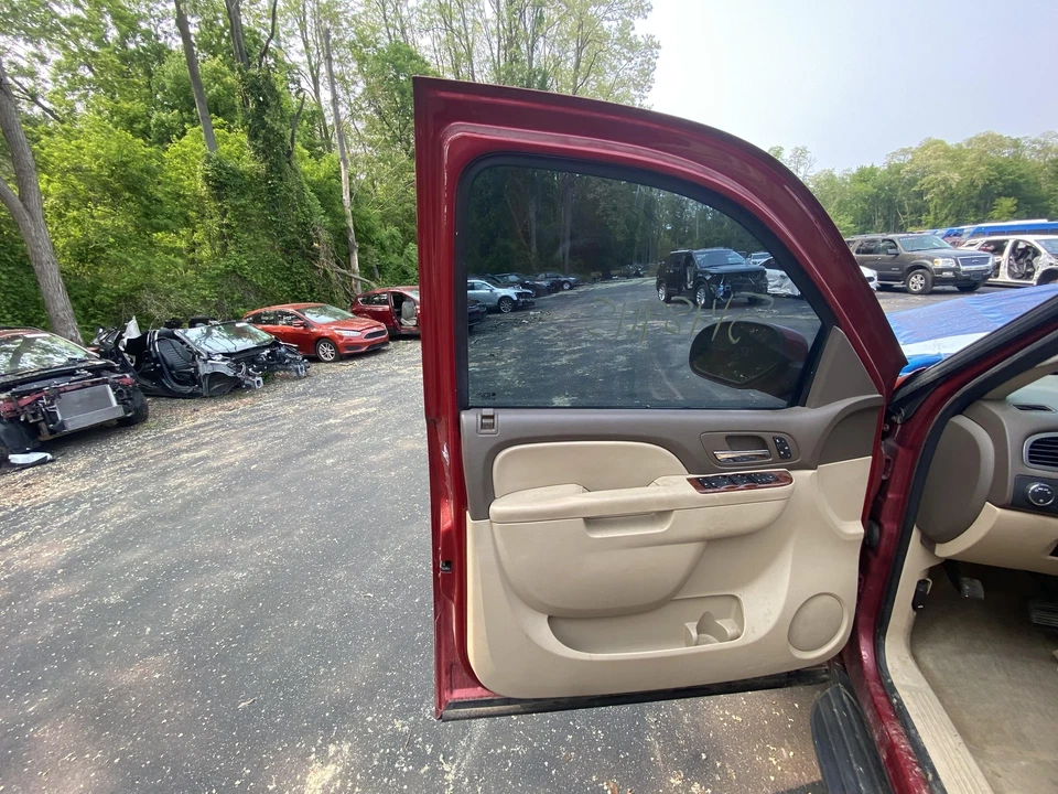 11 12 13 14 SUBURBAN 1500 puerta delantera izquierda Foto 4 de 4