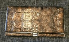 Elegant brown clutch with crocodile embossing