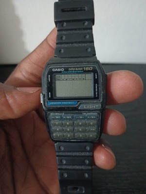 CASIO  150 Data Bank DBC-150 ILLuminator Calculator Watch Need New Battery Good